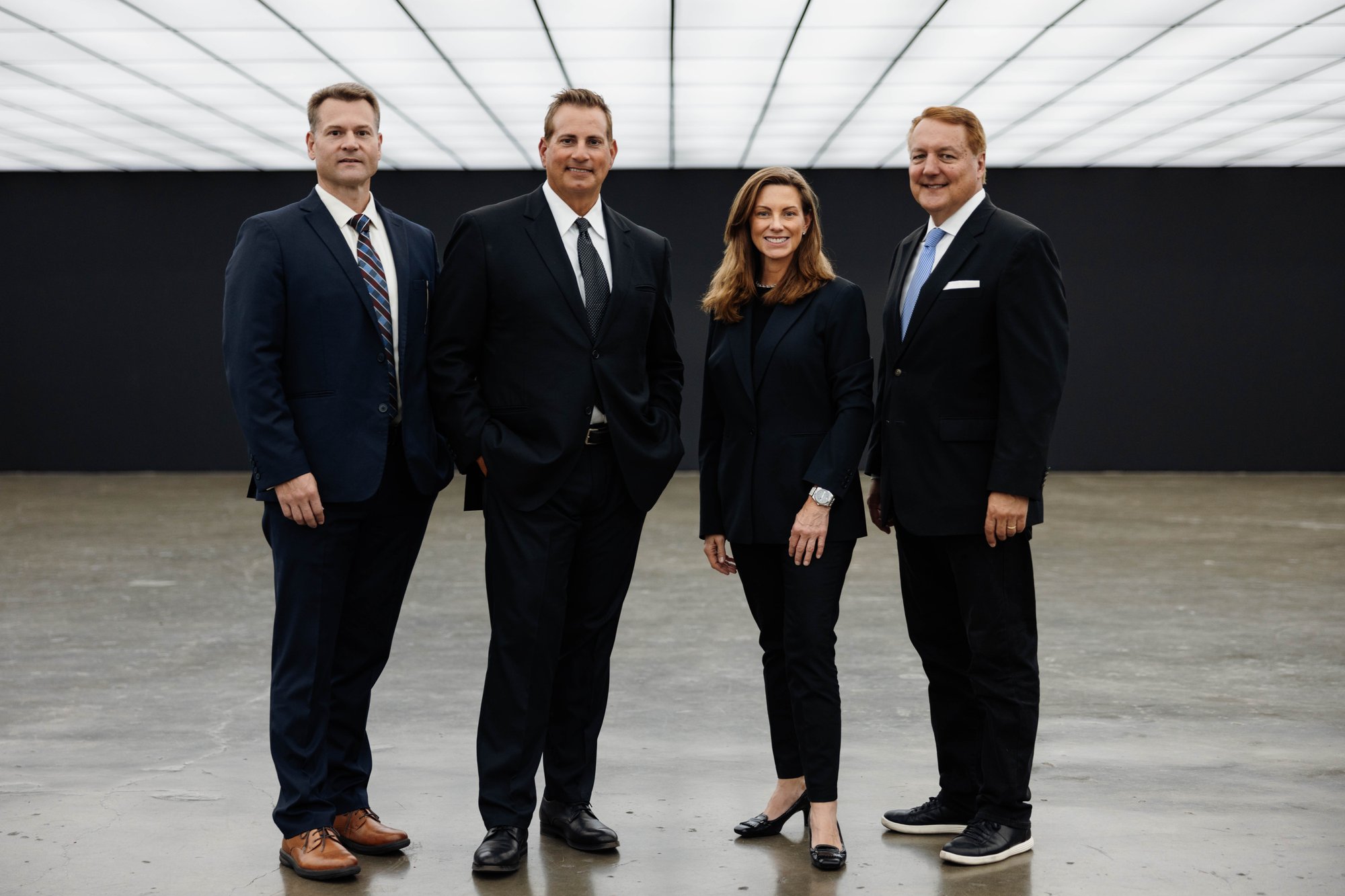 Four Frontieras team members in a 2024 company photograph